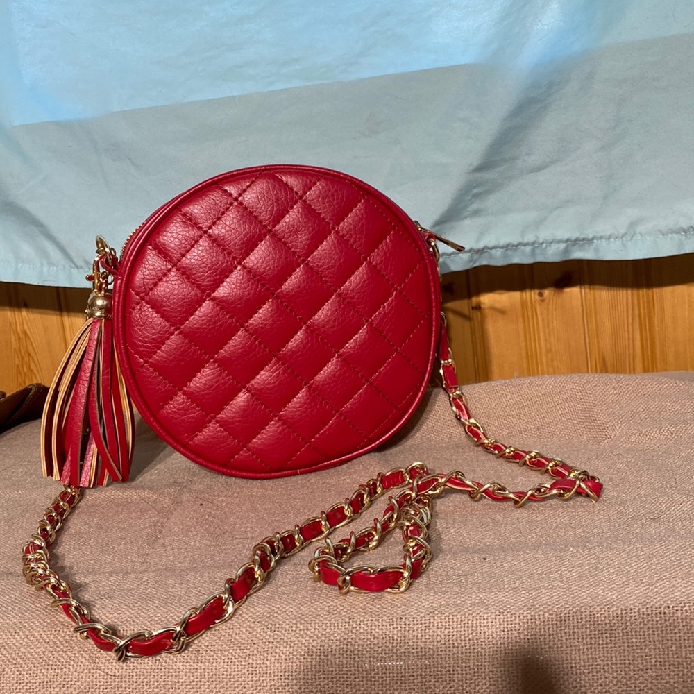 Never used faux leather red circle purse gold accent